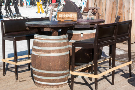 Reserved barrel shaped table in mountain chaletの写真素材