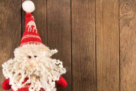 Santa Claus christmas decoration on wooden backgroundの写真素材