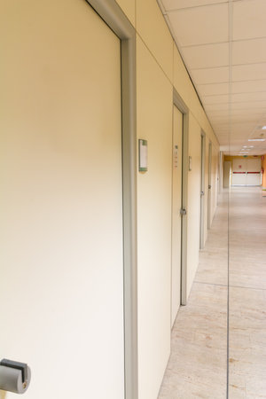 beige hospital hallway; empty hospital corridor; hospital interior healthcare seriesの写真素材