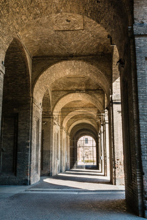 Archway, Columns, Courtyard and Cobblestones in Palace of Pilotta, Parma -Italyの写真素材
