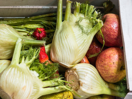 Fennels, Apples and Other Fruits and Fresh Vegetables Variety in White Wooden Boxの写真素材