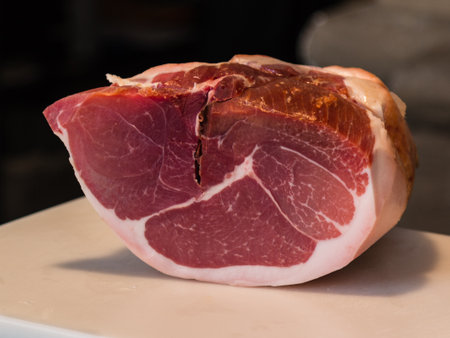 Raw Pork Leg, Italian Ham on White Table