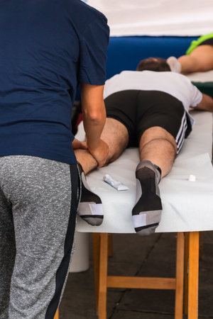 Athlete's Calf Muscle Professional Massage Treatment after Sport Workout, Fitness and Wellnessの写真素材