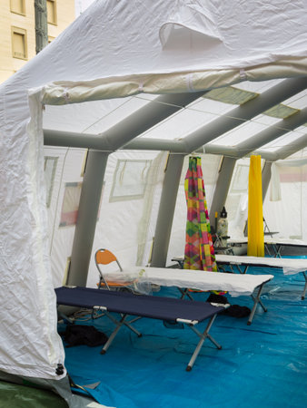 Emergency Medication, Camp Bed and Equipment inside Temporary Rescue Control Centre Tentの写真素材