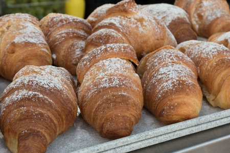 Fresh Croissants with Powdered Sugar for Continental Breakfastの写真素材
