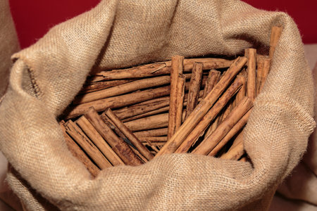 Brown Cinnamon Sticks inside Burlap Sackの写真素材