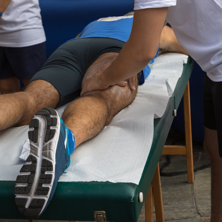 Athlete's Muscles Massage after Sport Workoutの写真素材