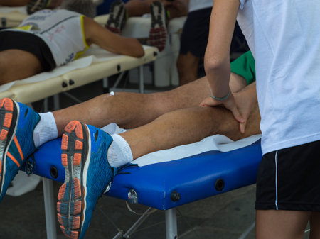 Athlete's Muscles Massage after Sport Workoutの写真素材