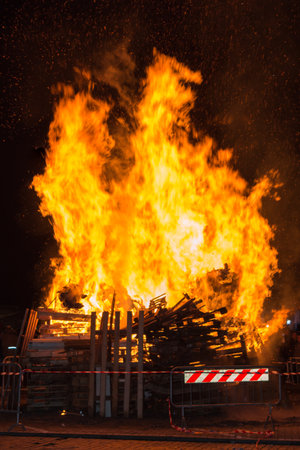 Big Wood Campfire with High Flames at Nightの写真素材