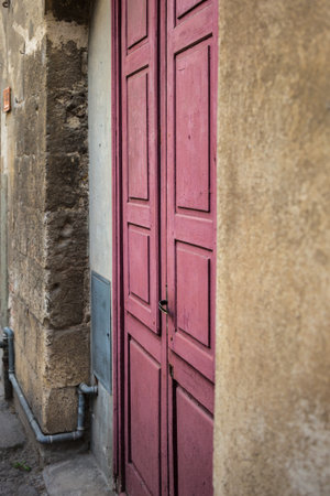Close-up of Ancient Red Wooden Doorの写真素材