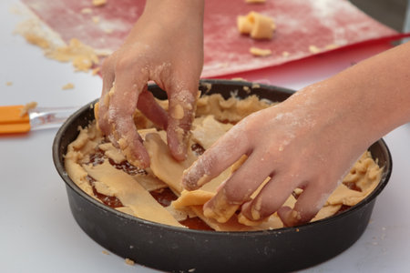 Raw Jam Tart Preparation on White Table