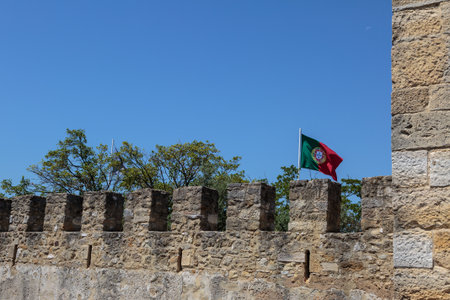 Castle of Sao Jorge: External Wall and Portuguese Flagsの写真素材