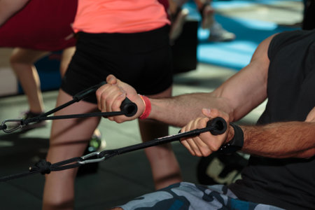 Boy in Class at Gym doing Crossfit Exercises