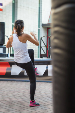 Young Girl: Boxing Workout in Outdoor Gym.