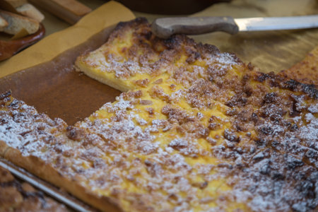 Traditional Italian Cream Cake with Powdered Sugarの写真素材