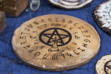 Wooden Round Spirit Game Board: Communication with Spirits.の写真素材