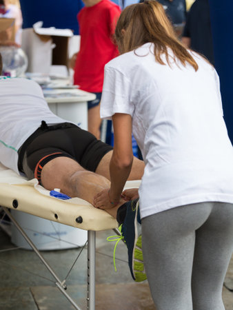 Athlete's Calf Muscle Professional Massage Treatment after Sport Workout: Fitness and Wellness