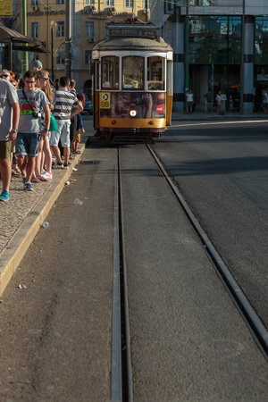 Typical Yellow Vintage Tram in Lisbon, Portugal.のeditorial素材