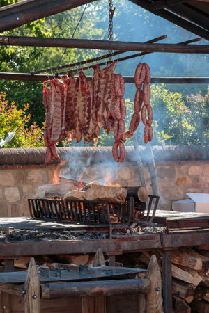 Outdoor grilled meat : Pork-chop and sausages, food themeの写真素材