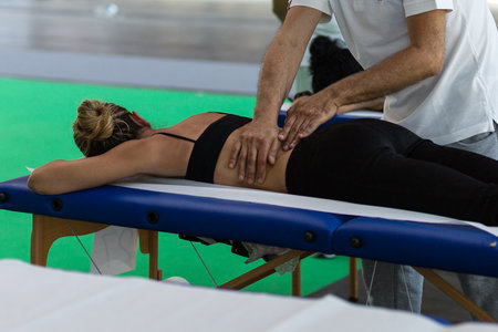 Athlete's Back Professional Massage after Fitness Activity; Wellness and Sport
