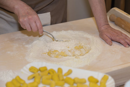 Preparation of Italian Pasta: Chef at Work in the Kitchen.の写真素材