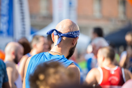 Bald Marathon Runner with a Bandana on his Head Ready to Take Part in the Race.の写真素材