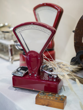 Ancient Red Scale for Food on White Table.の写真素材
