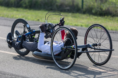 Disabled Athlete training with His Handbike on a Track.