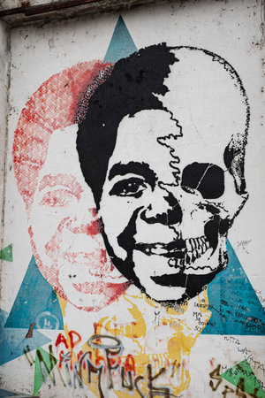 Painting on a Wall in a City depicting Actor Gary Coleman on Half a Face a Skull on the other Half.のeditorial素材