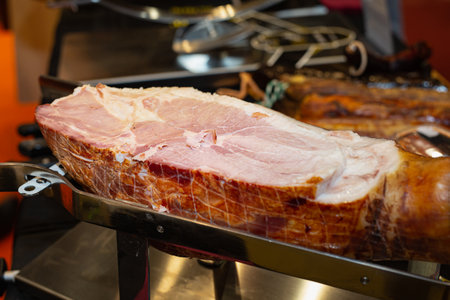 Cooked Ham inside a Metal Slicing Equipment.の写真素材