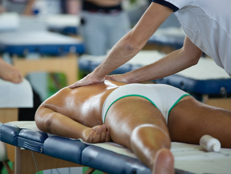 Athlete's Back Massage after Fitness Activity - Wellness and Sportの写真素材