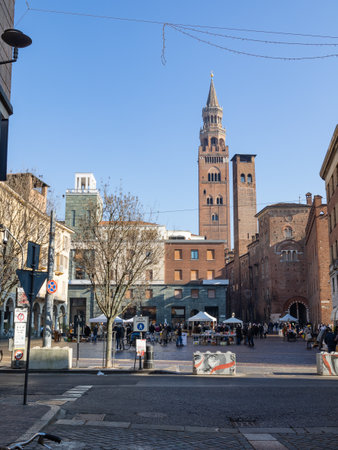Stradivari Square and a view of the Torrazzo in Cremona located next to the Cathedral, Italy.
