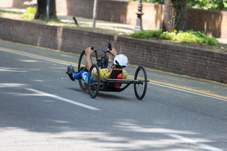 Athlete with its Special Bike on a City Track during a Race.