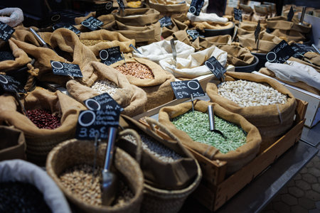 Various Types of Beans and other types of Seeds in Jute Bags for Sale at the Market.