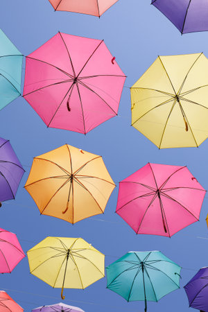 Umbrellas Suspended and Joined with Each other to Form a Roof of Colorful Umbrellas.