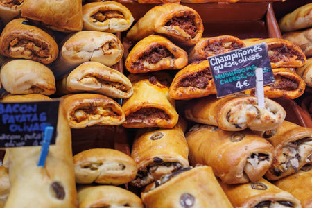 Group of Stuffed Sandwiches with Olives, Eggplant and Other Vegetables on the Counter for Sale.の写真素材