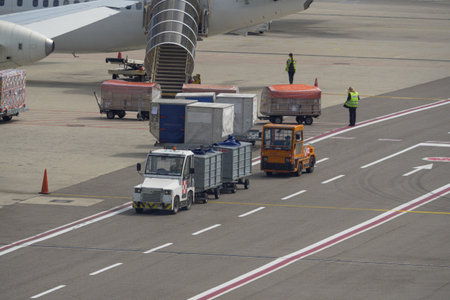 Boarding Operations of Parcels, Suitcases and Groceries for Scheduled Flight at Airport.の写真素材