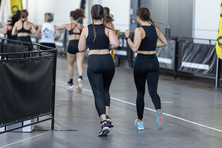 Indoor Marathon - Girls running Together.