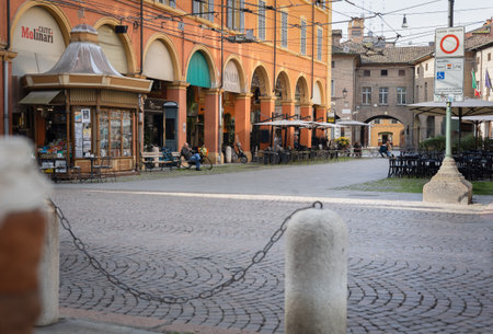 Corso Duomo in Modena, Arcades, Historic Newspaper Shop and Coffee Shops, Italy.