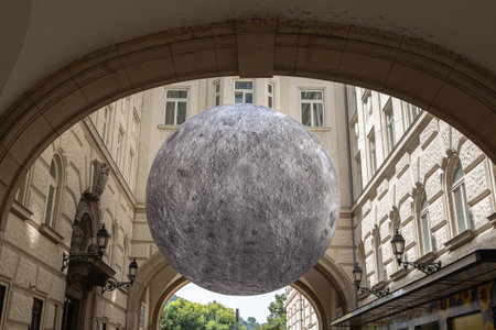 Artistic installation of a Moon in the middle of Buildings in Budapest - Hungary.の写真素材