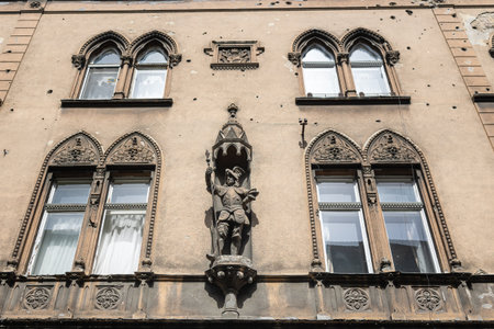 Historic Building with Gothic Architecture and a Solitary Figure in Budapest - Hungary.の写真素材
