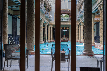 Indoor GellÃ©rt Hotel Swimming pool and Spa with People, Budapest - Hungary.
