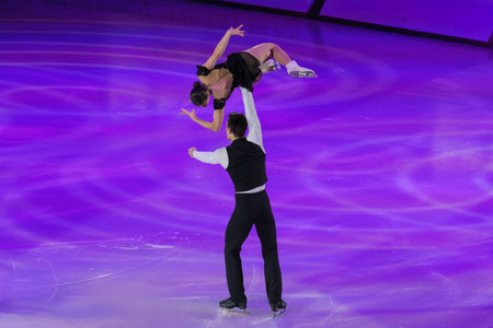 Couple performing Artistic and Technical performance on the Ice Rink.の写真素材