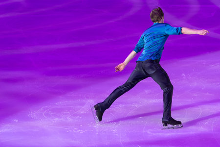 Skater performing Artistic and Technical performance on the Ice Rink.の写真素材