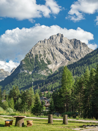 Summer Day In The Italian Dolomite, Canazei's Majestic Mountain Under Blue Sky, Italy.の写真素材