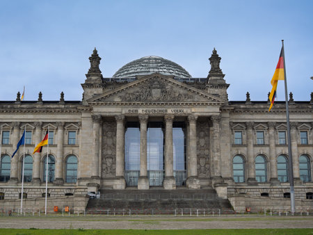 Berlin Parliament House Exterior, Front View Of Massive Reichstag Building With German Flags - Germany.の写真素材