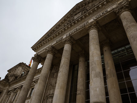 Massive Neoclassical Architecture Of Berlin Parliament House And Inscription, Reichstag Building Pediment Columns Against Sky.の写真素材