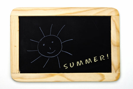 a chalkboard with a sunの写真素材