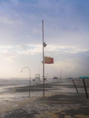 strong summer storm sweeps the beach of Versiliaの写真素材