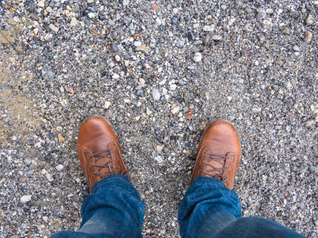 Two feet on the ground in gravel